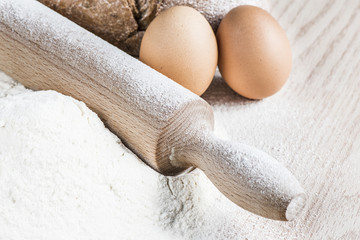 Rolling Pin,flour,eggs and bread