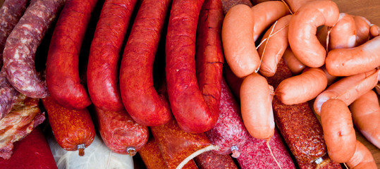Many uncooked smoked sausages