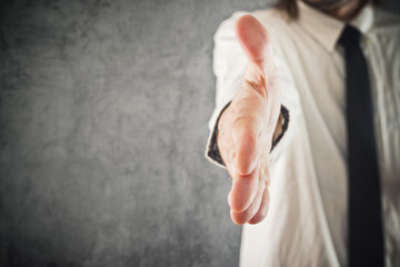 Businessman offering hand for a handshake