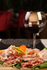 Mixed cold cuts with wine