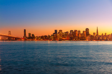 San Francisco sunset skyline California bay water reflection