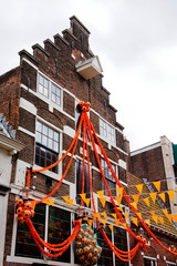 House in Amsterdam decorated with orange flags