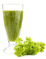 Glass of green vegetable juice and salad isolated on white