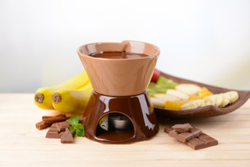 Chocolate fondue with fruits,