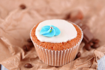 Tasty cupcake with butter cream,