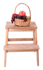 Wicker basket with fruits,