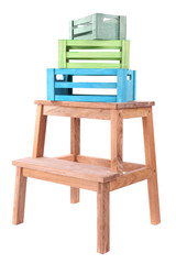 Empty wooden boxes on small ladder, isolated on white