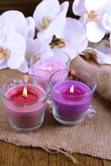 Fototapeta na wymiar Composition with beautiful colorful candles, sea salt and