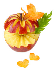 Fototapeta na wymiar Carving apple isolated on white
