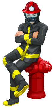 A fireman sitting above the hydrant