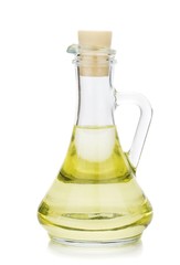 Salad dressing vinegar oil in a glass pouring jug with cork