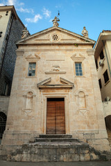Fototapeta na wymiar Small old Catholic Church in Perast town, Montenegro
