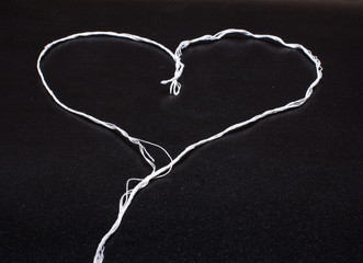 Fototapeta na wymiar Heart shaped yarn