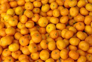 oranges pile colorful background