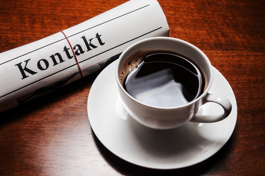 kontakt newspaper, cup of coffee