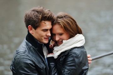Lovely couple enjoying fall in love at park