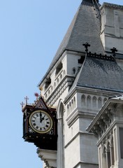 Fototapeta na wymiar Clock at Royal Court of Justice