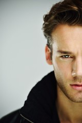 Obraz premium Young man studio shoot posing closeup