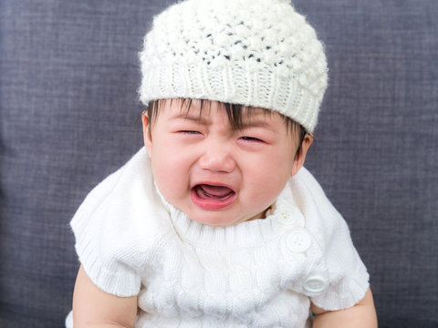 Asian baby crying
