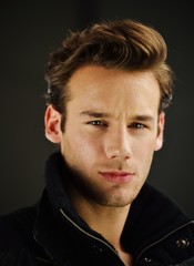 Young man studio shoot posing closeup