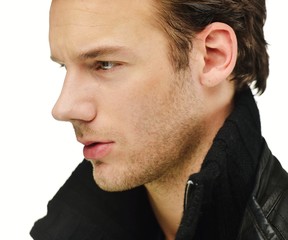 Fototapeta premium Young man studio shoot posing closeup