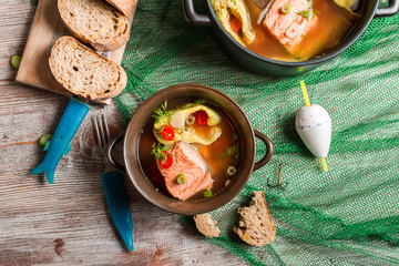 Fish soup spiced with dill and chilli pepper