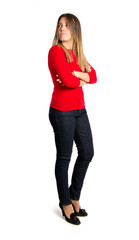 Girl with her arms crossed over isolated background