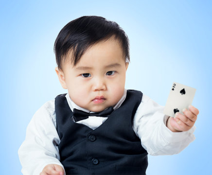 Baby boy with poker card
