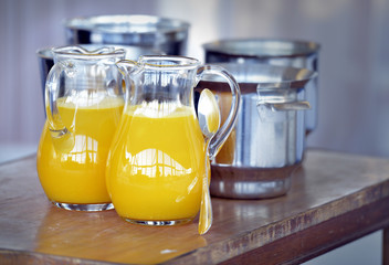 Jug and glass with orange juice