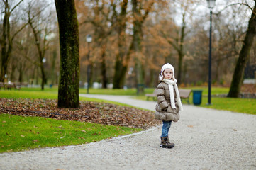 Little girl at autumn