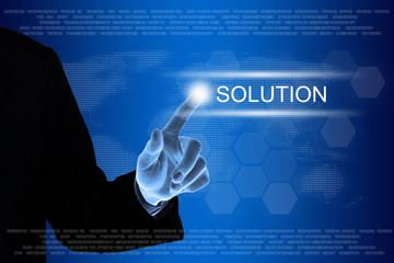 business hand clicking solution button on touch screen