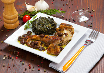 baked rabbit with vegetables in a dish
