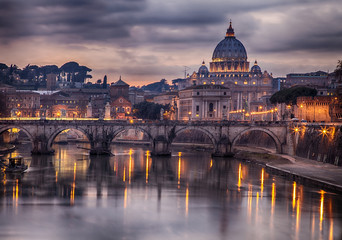 Fototapeta na wymiar Illuminated bridge in Rome Italy