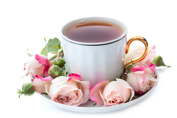 Cup of tea and roses