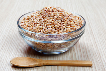 dried spelt in a bowl on a table