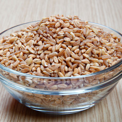 dried spelt in a bowl on a table