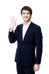 Young businessman isolated on white