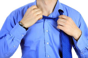 Taking off a tie