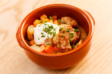 meat and vegetables in the pot