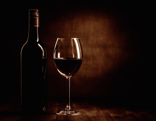 Rew wine bottle and glass