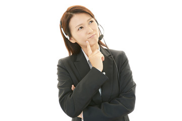 疲れた表情のオペレーター