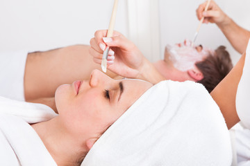 Couple Applying Facial Mask