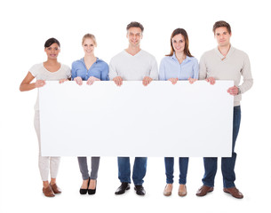 Group Of People With Billboard