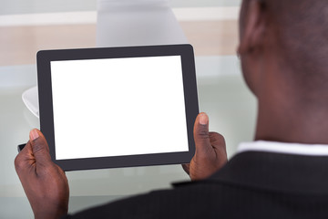 Businessman Holding Digital Tablet