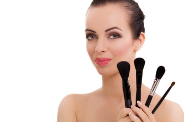 beauty girl with makeup brushes