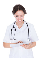 Female Doctor Using Digital Tablet