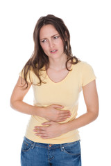 Young Woman Suffering From Stomach Ache
