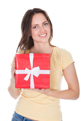 Smiling Woman Holding Gift Box