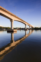 Fototapeta premium Reflection of a bridge with blue sky at Sabah, Borneo, Malaysia