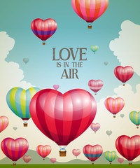 Fototapety  Balony na ogrzane powietrze w kształcie serca startują z efektem vintage